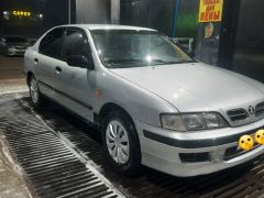 Photo of the vehicle Nissan Primera