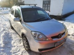 Сүрөт унаа Mazda Demio