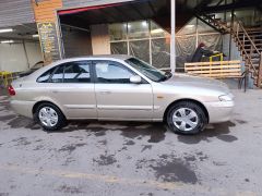 Фото авто Mazda 626