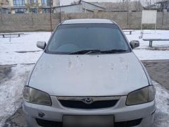 Фото авто Mazda Familia