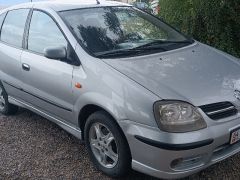 Фото авто Nissan Almera Tino