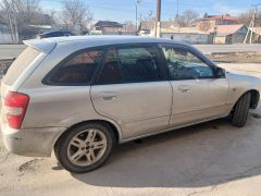 Сүрөт унаа Mazda 323