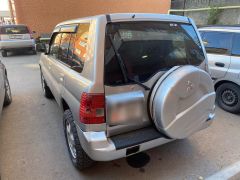 Сүрөт унаа Mitsubishi Pajero iO