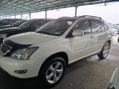 Photo of the vehicle Lexus RX