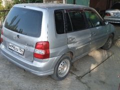 Photo of the vehicle Mazda Demio