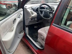 Photo of the vehicle Nissan Almera Tino