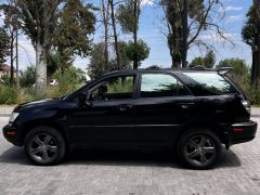 Photo of the vehicle Lexus RX