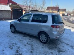 Photo of the vehicle Mazda Demio