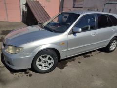 Фото авто Mazda 323