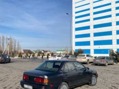 Сүрөт унаа Mazda 323