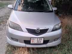 Photo of the vehicle Mazda Demio