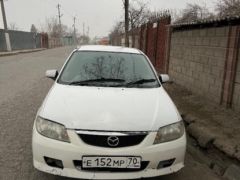 Фото авто Mazda Familia