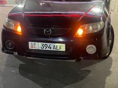 Фото авто Mazda Protege