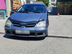 Фото авто Nissan Almera Tino