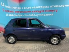 Photo of the vehicle Nissan March