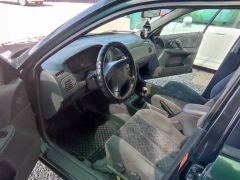 Photo of the vehicle Mazda 323