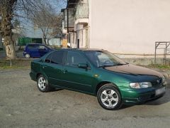 Photo of the vehicle Nissan Almera