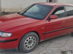 Фото авто Mazda 626