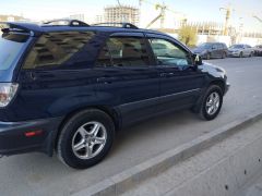 Photo of the vehicle Lexus RX