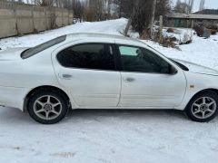 Photo of the vehicle Nissan Cefiro