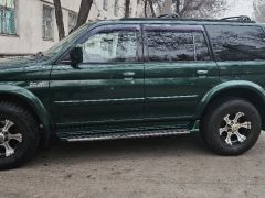 Сүрөт унаа Mitsubishi Montero Sport