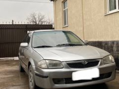 Фото авто Mazda 323