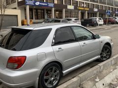 Photo of the vehicle Subaru Impreza WRX STi