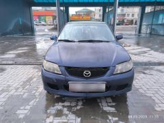 Фото авто Mazda 323