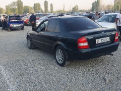 Фото авто Mazda 323