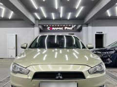 Фото авто Mitsubishi Lancer