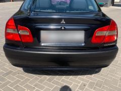 Сүрөт унаа Mitsubishi Carisma