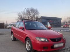 Сүрөт унаа Mazda 323