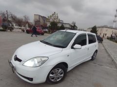 Фото авто Mazda Demio