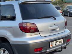 Сүрөт унаа Mitsubishi Outlander