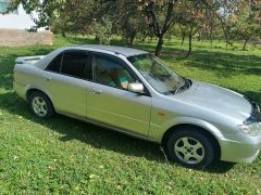 Фото авто Mazda Familia