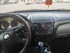 Фото авто Nissan Almera