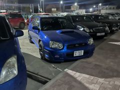 Фото авто Subaru Impreza WRX STi