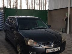 Фото авто Mitsubishi Lancer