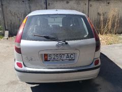 Photo of the vehicle Nissan Almera Tino