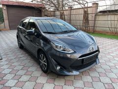 Фото авто Toyota Prius c