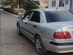 Сүрөт унаа Mitsubishi Carisma