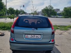 Фото авто Nissan Almera Tino