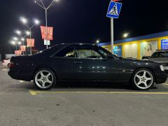 Сүрөт унаа Mercedes-Benz W124