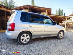 Photo of the vehicle Mazda Demio