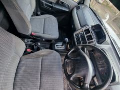 Фото авто Mitsubishi Pajero iO