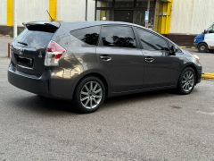 Photo of the vehicle Toyota Prius v (+)