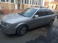 Сүрөт унаа Mazda 323