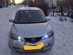 Фото авто Mazda Demio