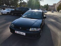 Photo of the vehicle Mazda 323