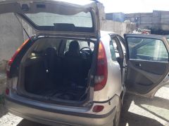 Photo of the vehicle Nissan Almera Tino